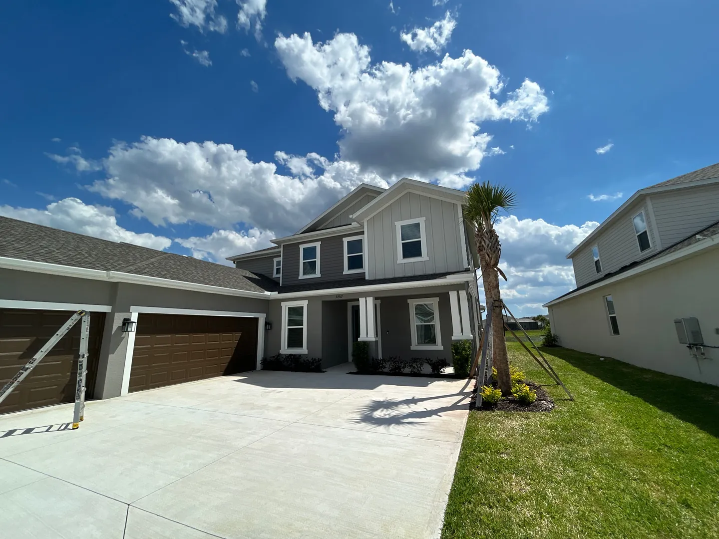 6-inch seamless gutters along the roofline of a two-story Tampa FL home
