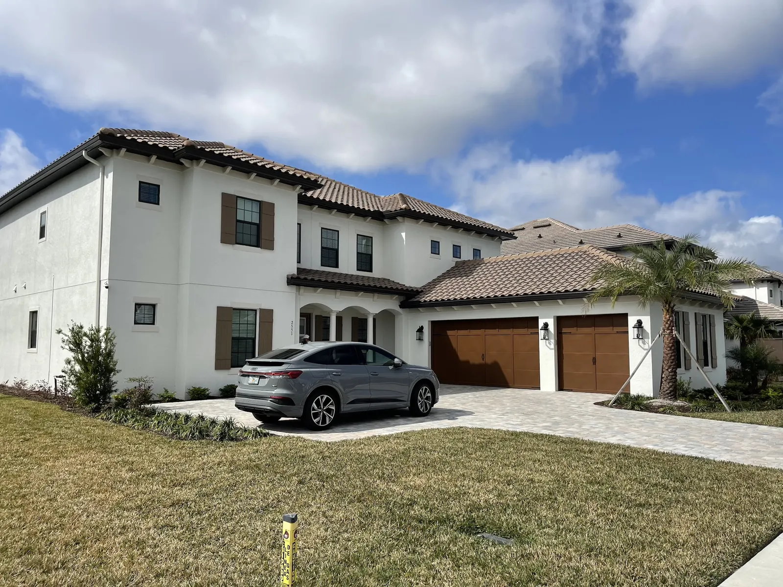 Two-story Florida home with newly installed seamless gutters