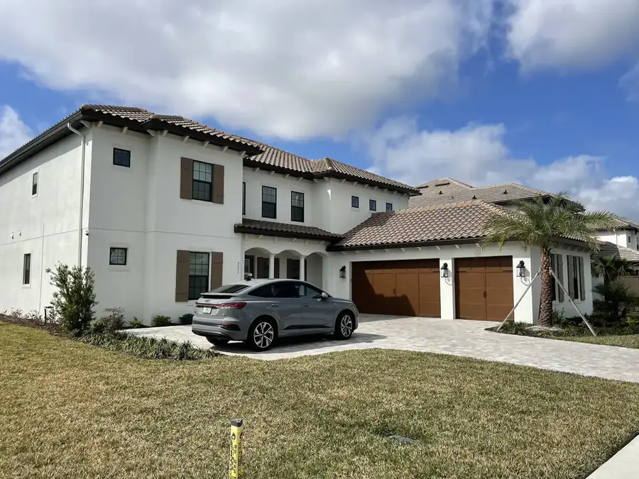 Two-story Florida home with newly installed seamless gutters